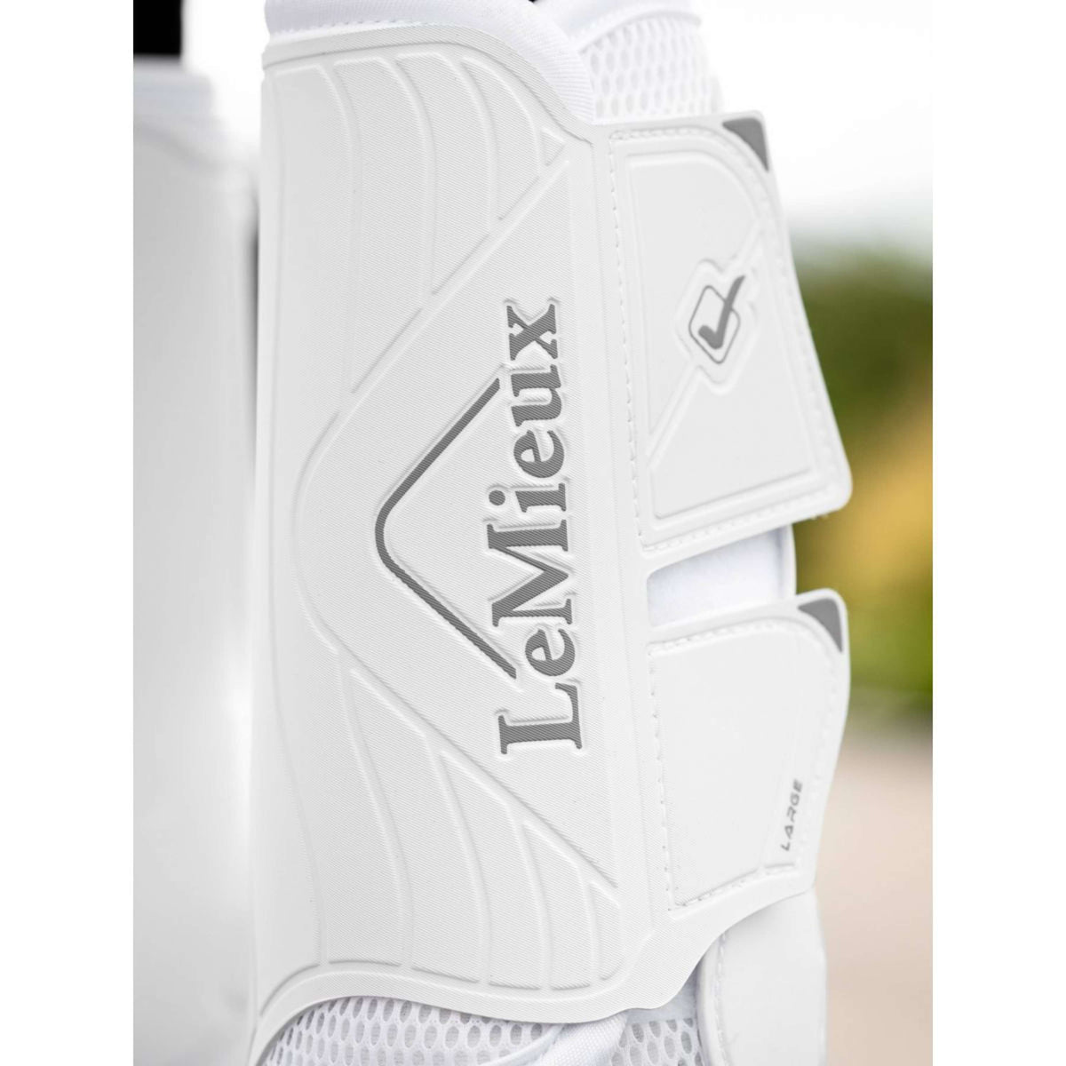 LeMieux Protectores de piernas Motionflex Blanco