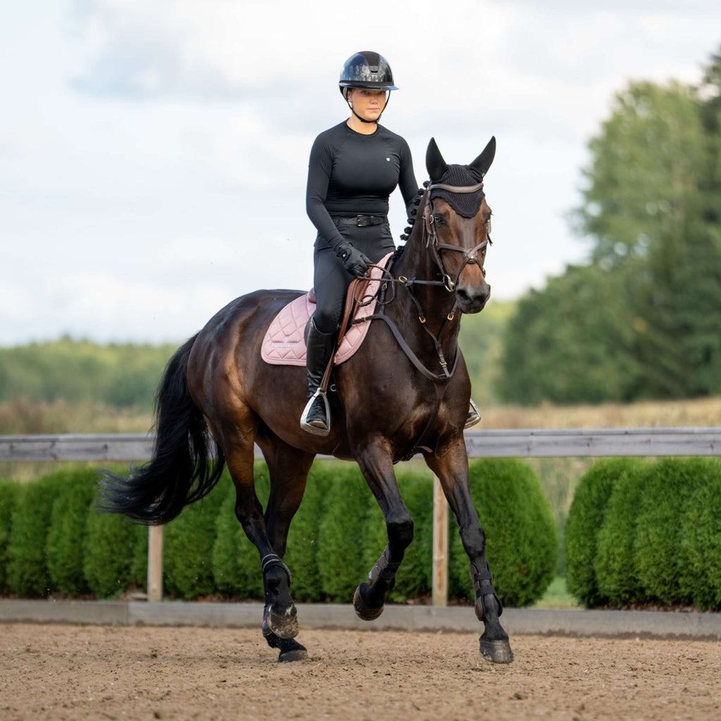 Equestrian Stockholm Mantilla Line saltando Rosa